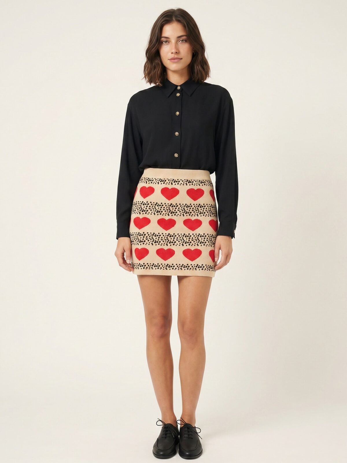 Falda mini de punto crema con topos y corazones en jacquard de Pepaloves en Tiendas Via Vai Estepona