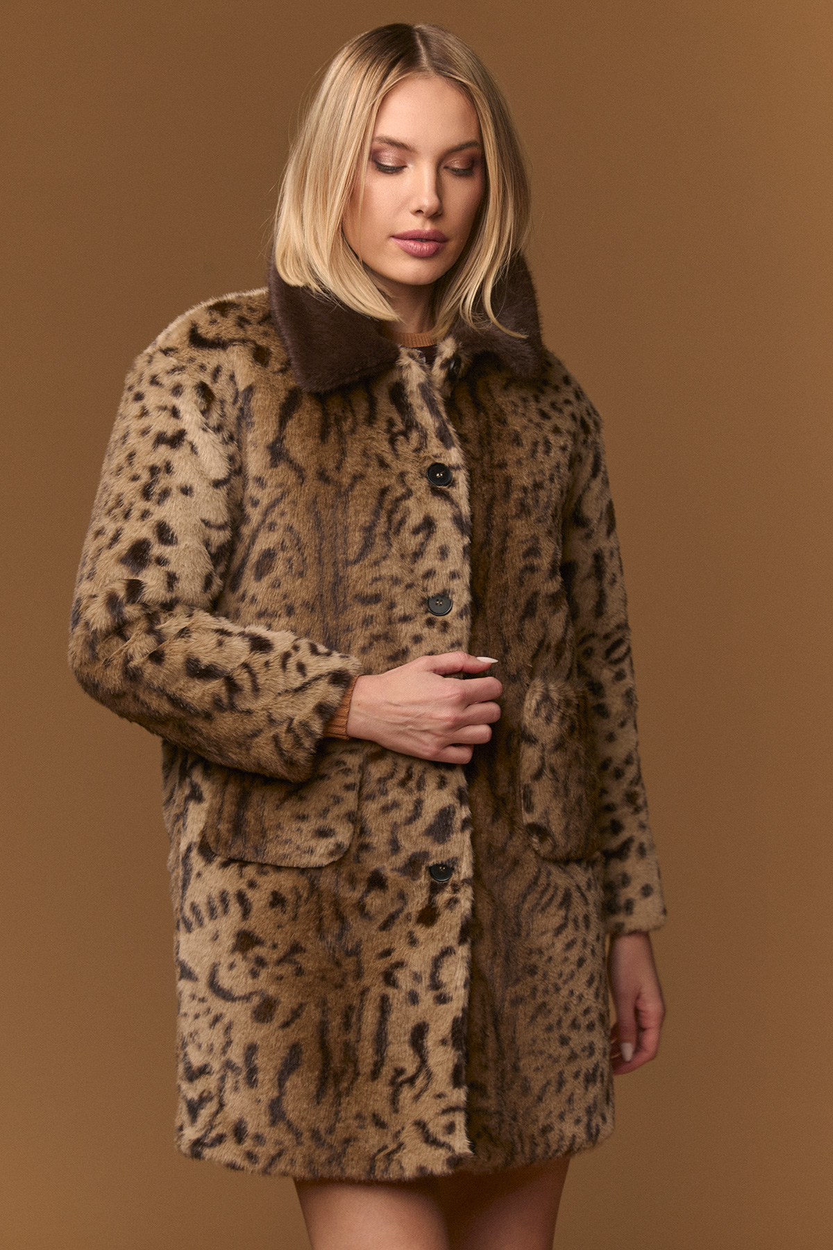 Abrigo Kensington de Minueto – tienda de ropa de mujer en Estepona, Costa del Sol